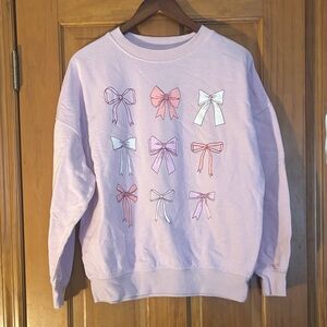 Mighty Fine Pastel Bow Graphic Lilac Crewneck Sweatshirt
